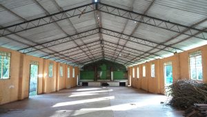 The hall belonging to the school which if refurbished could become a key facility for the boys and locally and help to make the home more self-sufficient .