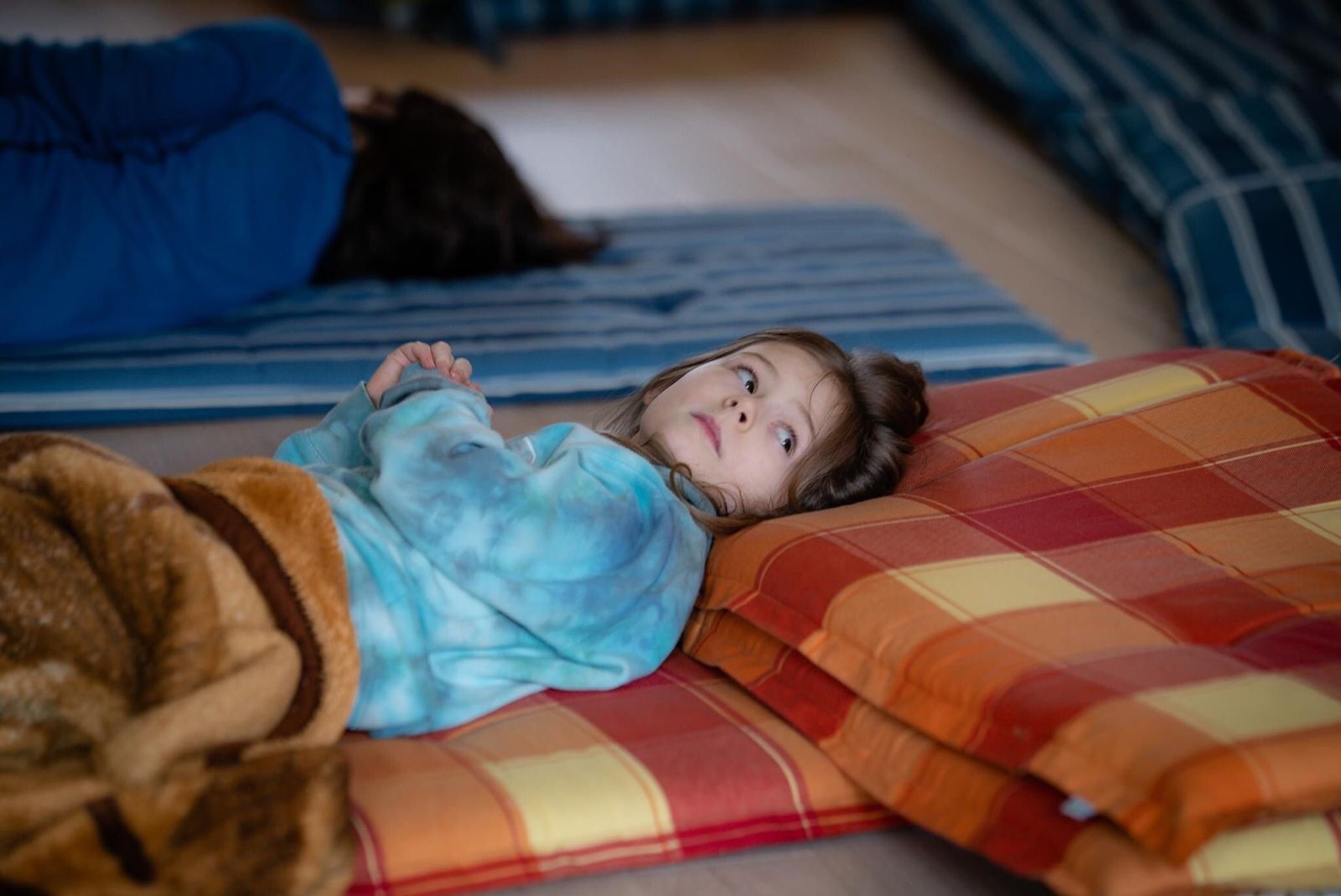 Ukrainian refugee girl sleeping